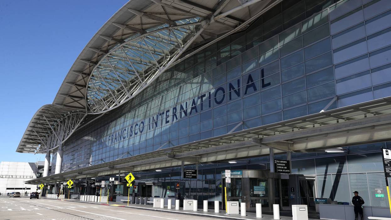 A suspect has been arrested for attacking three travelers with an “edged weapon” at San Francisco International Airport Friday night.