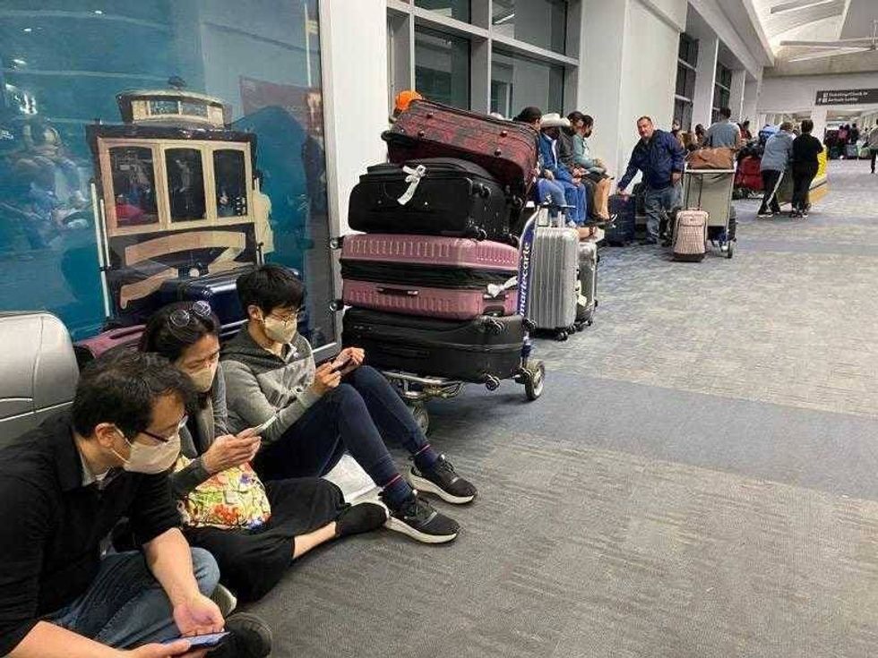 A suspect is in custody after the international terminal at San Francisco International Airport was evacuated late Friday due to a "suspicious device" labeled as "possibly incendiary."
