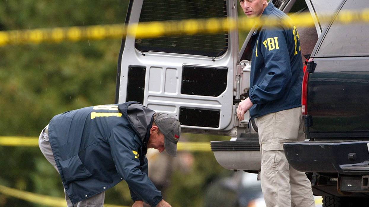 A suspect is in custody following a Wednesday morning robbery and shooting outside a Chase Bank branch in Balch Springs, where an armored car employee was critically injured while handling cash at an ATM lane