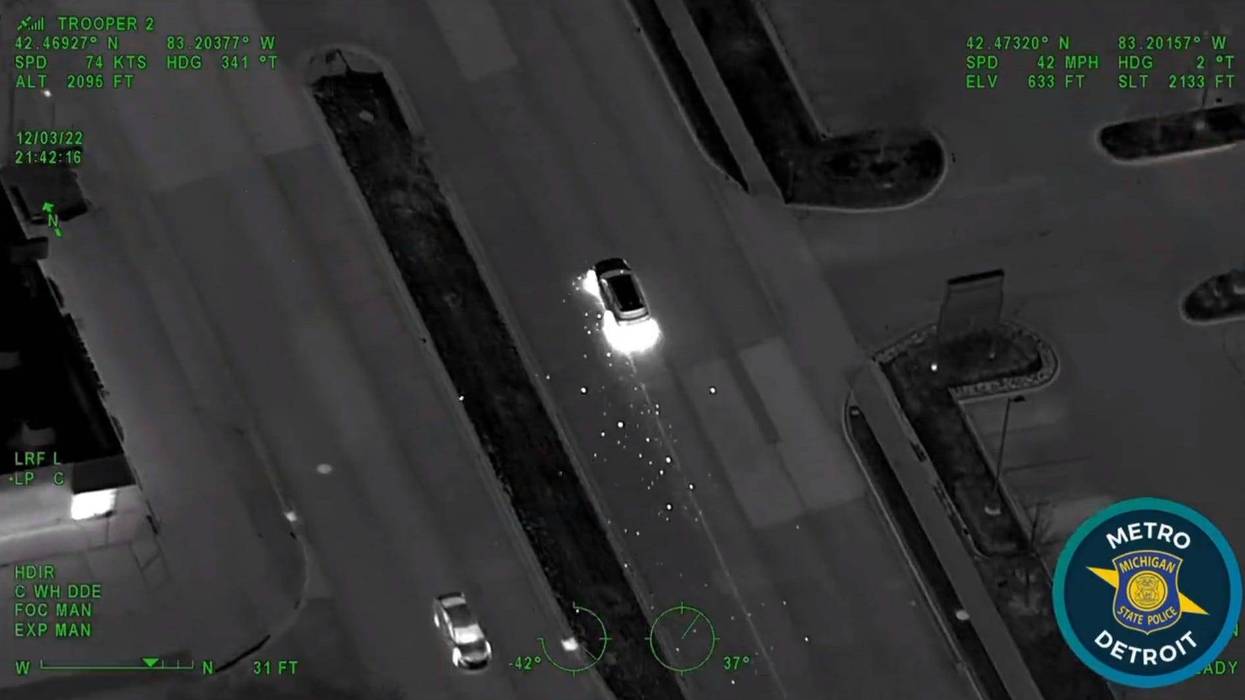 A suspect wanted for auto theft is behind bars for a string of alleged crimes, including robbing a Dunkin Donuts and leading troopers on a dangerous high speed chase from Southfield to Detroit, state police said.
