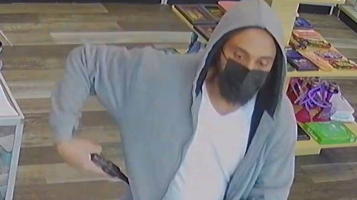 A suspect wanted for the killing of a smoke shop employee in Crum Lynne.