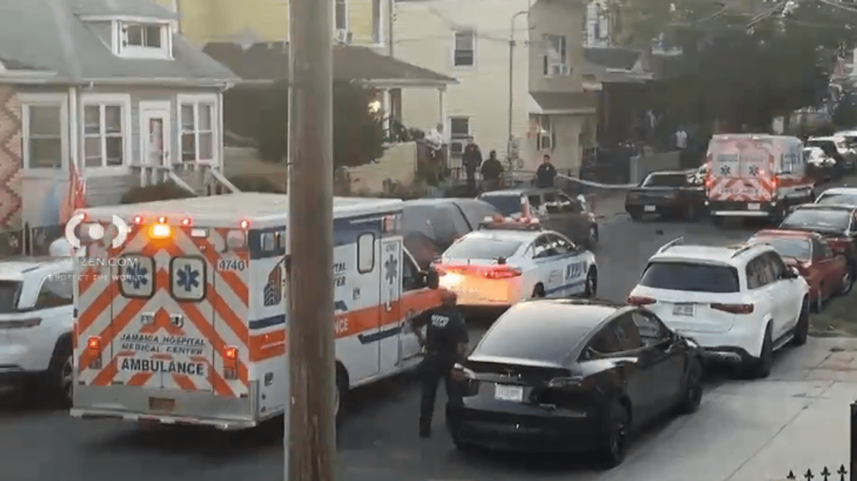 A suspect was detained after a fatal shooting in Queens Tuesday night.