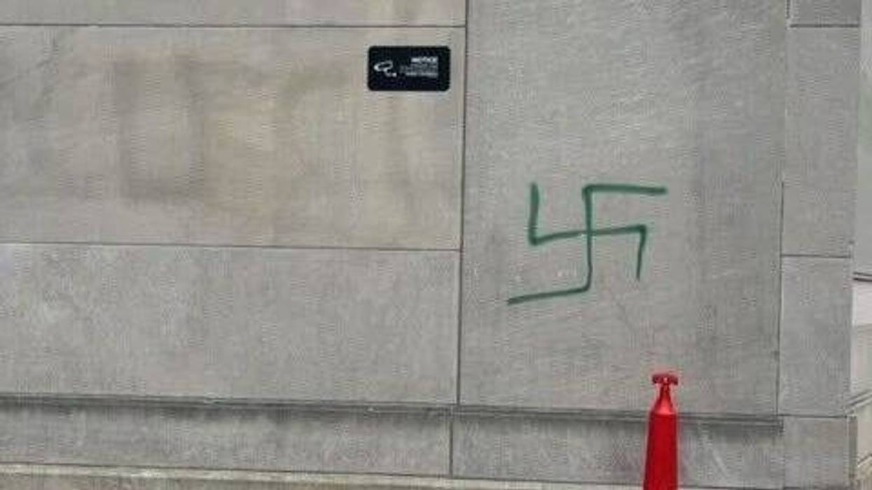 A swastika was spray-painted on a building adjacent to a Holocaust memorial in Center City in January.