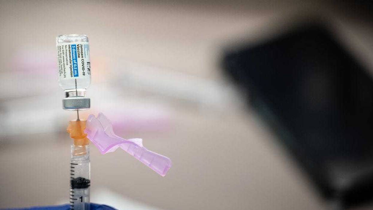 A syringe with a dose of the Johnson & Johnson COVID-19 vaccine is filled at Wayside Christian Mission on March 15, 2021 in Louisville, Kentucky. Norton Healthcare, in coordination with Metro Louisville and Louisville Public Health and Wellness, held a COVID vaccination event at Wayside Christian Mission for the many people without homes served at that location. (Photo by Jon Cherry/Getty Images)