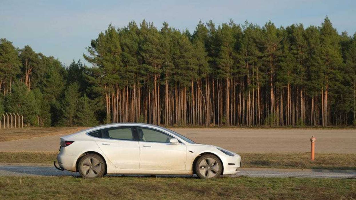 A Tesla Model 3 stands where the newly-announced Tesla Gigafactory is planned at Freienbrink on November 14, 2019 in Gruenheide, Germany. (Photo by Sean Gallup/Getty Images)