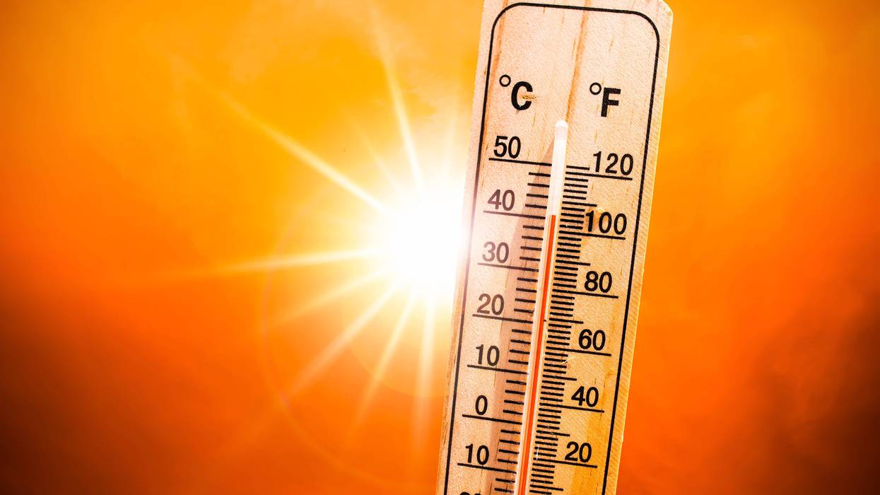 A thermometer bakes in the sun.