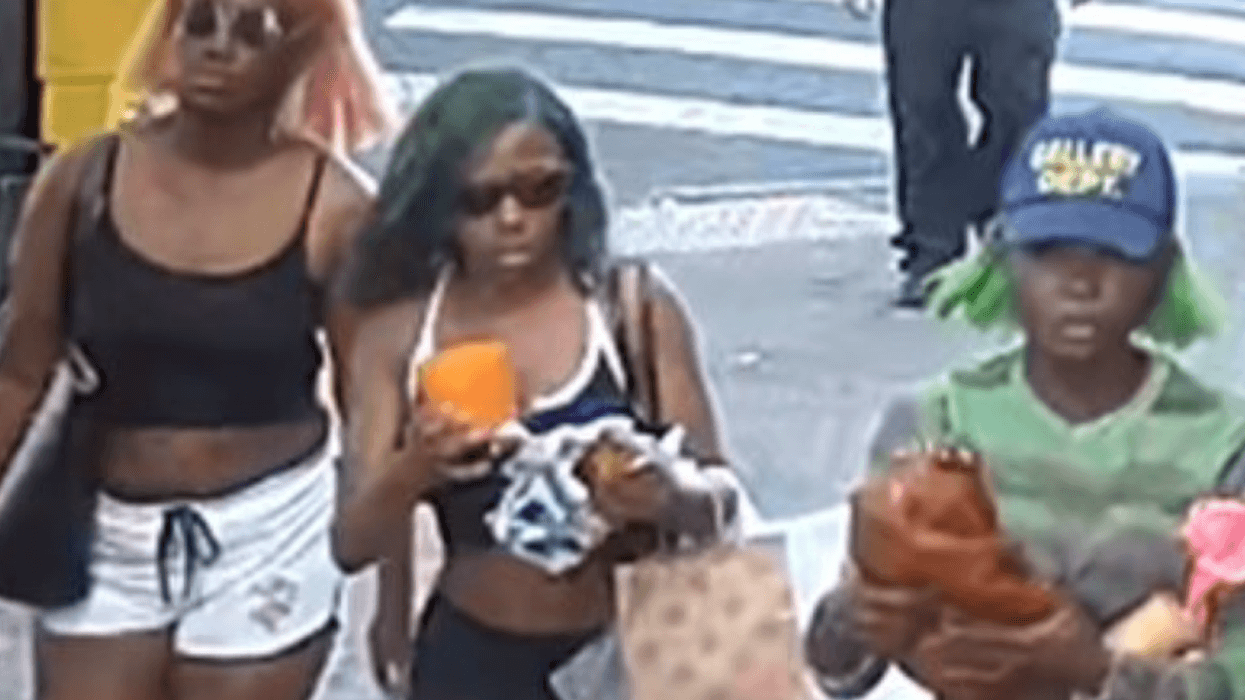 A third suspect has been charged in connection with her role in the bloody "anti-white" attack on an MTA bus in Queens last month.