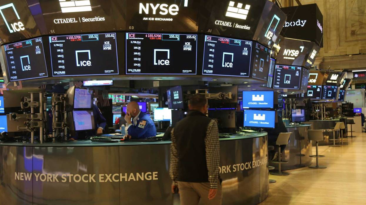 A trader walks on the trading floor of the New York Stock Exchange in New York, on Nov. 6, 2024. U.S. stocks surged to record highs on Wednesday following Republican Donald Trump's victory in the 2024 presidential election.
