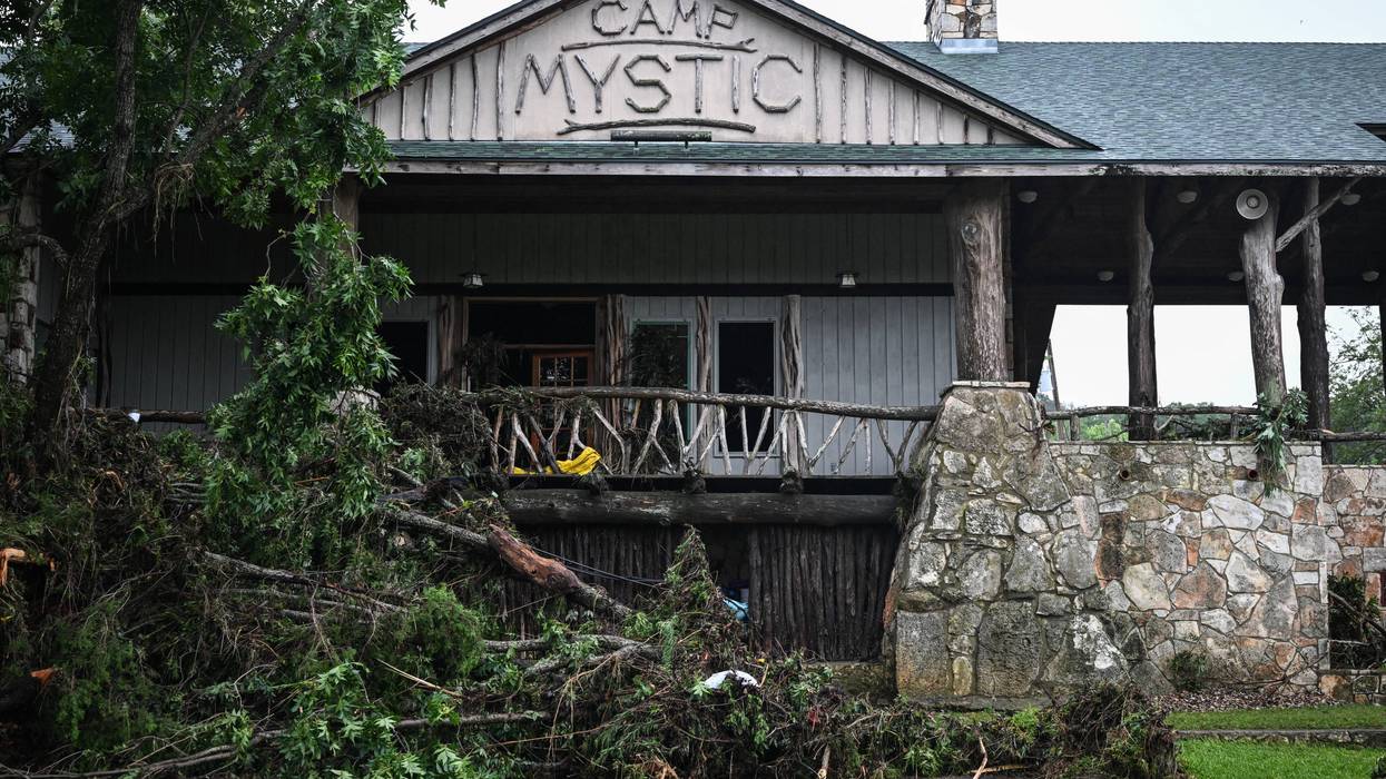 A Travis County judge on Wednesday allowed Camp Mystic to move forward with summer plans but ordered the owners to leave the flood-ravaged section of the Hunt, Texas, property completely untouched