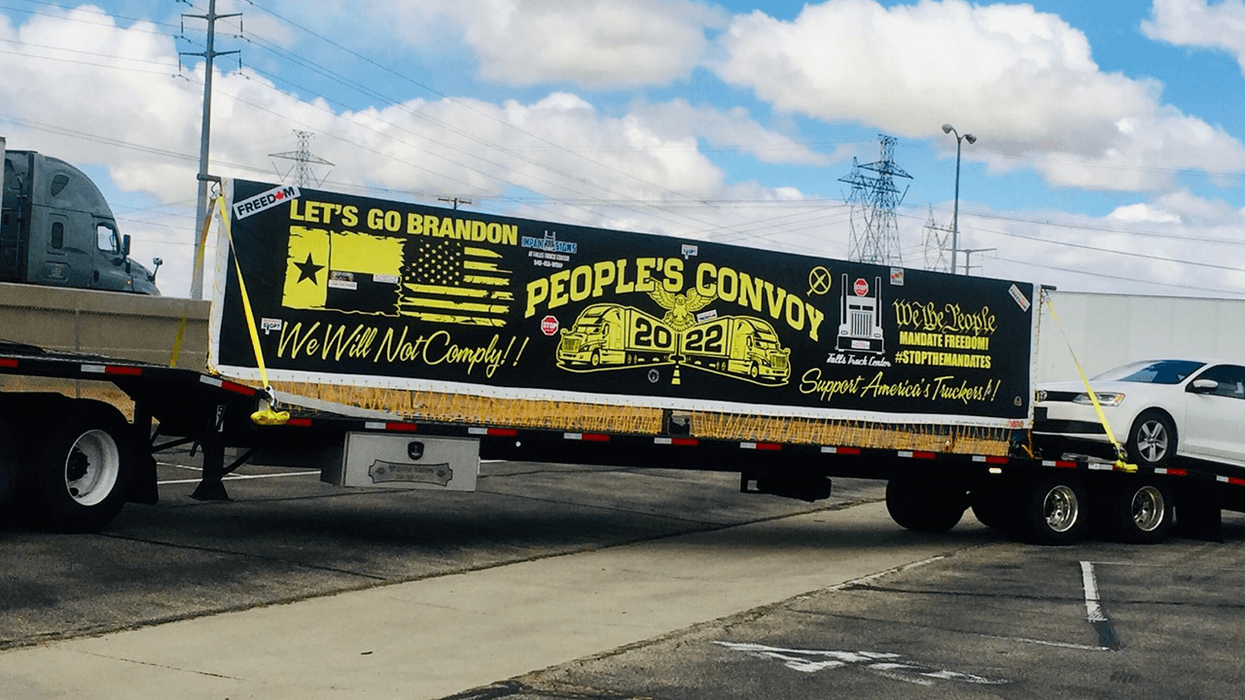 A truck participating in the "People's Convoy," a caravan of truckers that are set to caravan from Adelanto, Calif. to Washington, D.C., seen leaving the town the morning of Feb. 23, 2022.