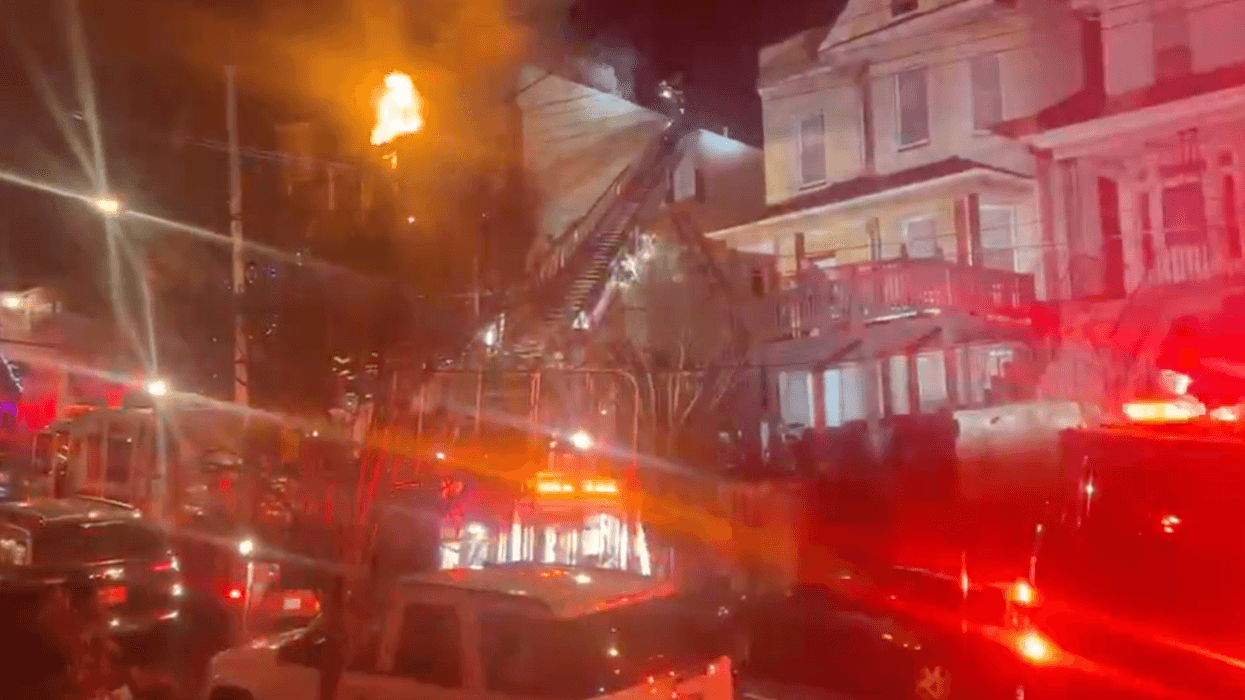 A two-alarm Staten Island house fire on Friday night sent two people to the hospital, one of which is in critical condition.