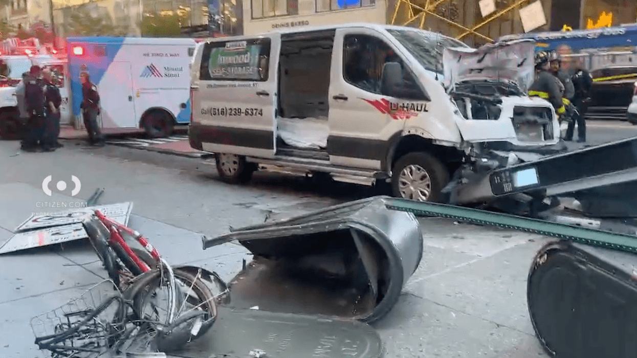 A U-Haul van lot control in Midtown on Tuesday afternoon, injuring three people, including the driver.