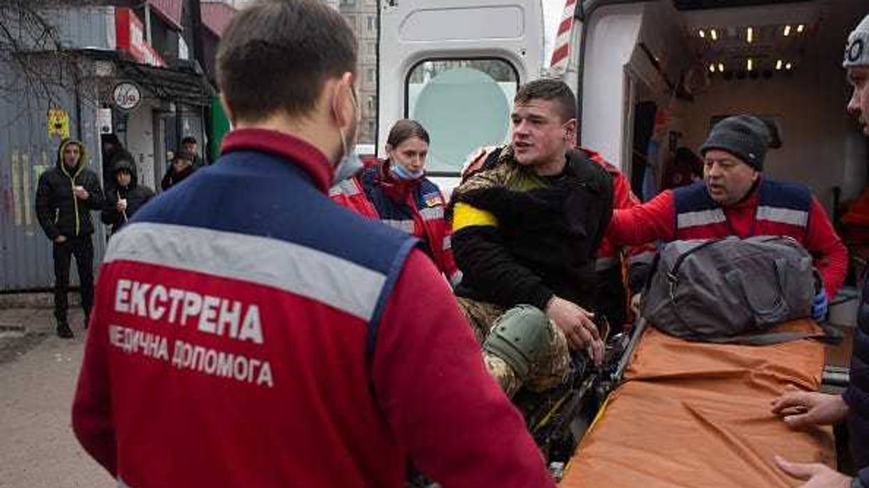 A Ukrainian serviceman, who was wounded in his shoulder during shelling in Irpin gets transferred to the hospital on March 6, 2022 in Kyiv, Ukraine.