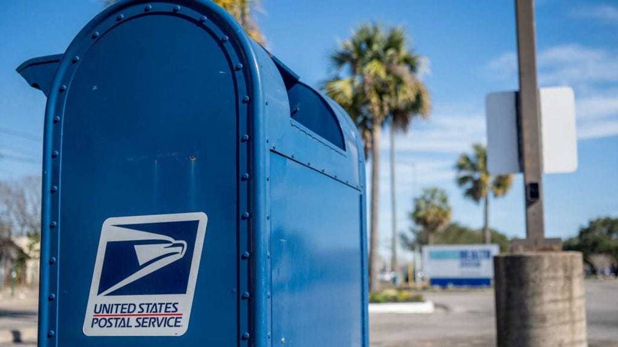 A US Postal service mailbox is seen in a parking lot on February 10, 2022 in Houston, Texas. On February 8, the House of Representatives passed the Postal Service Reform Act of 2022 (H.R. 3076).