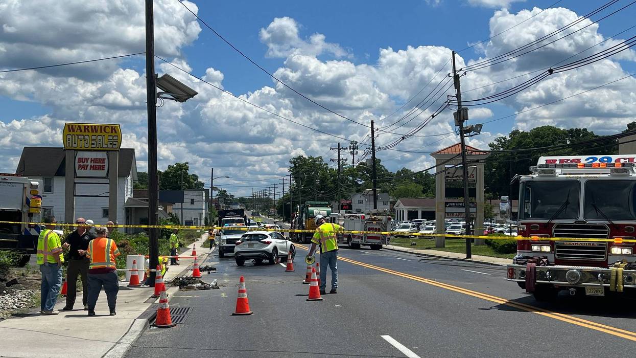 A utility worker is dead and several other people are injured after a car crashed into a worksite on the White Horse Pike in Magnolia, Camden County.
