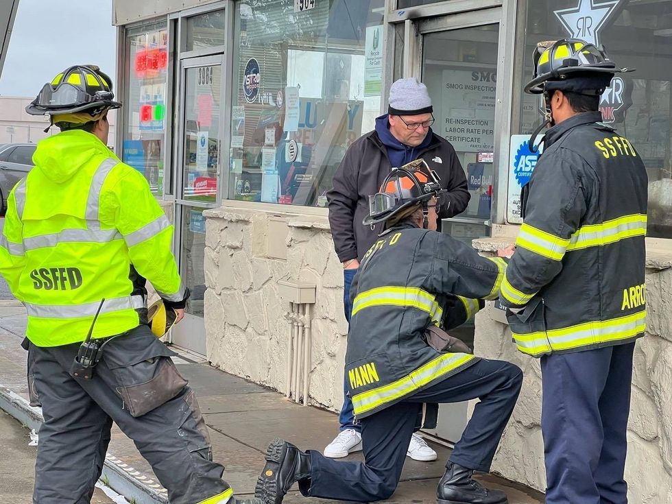 A Valero gas station in South San Francisco is closed after rain and intense winds blew the canopy over onto the gas pumps.