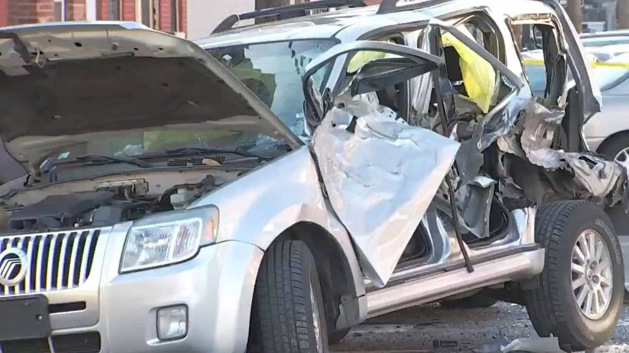 A vehicle that a stolen SUV crashed into Wednesday in Mantua. A 78-year-old woman inside the vehicle died.