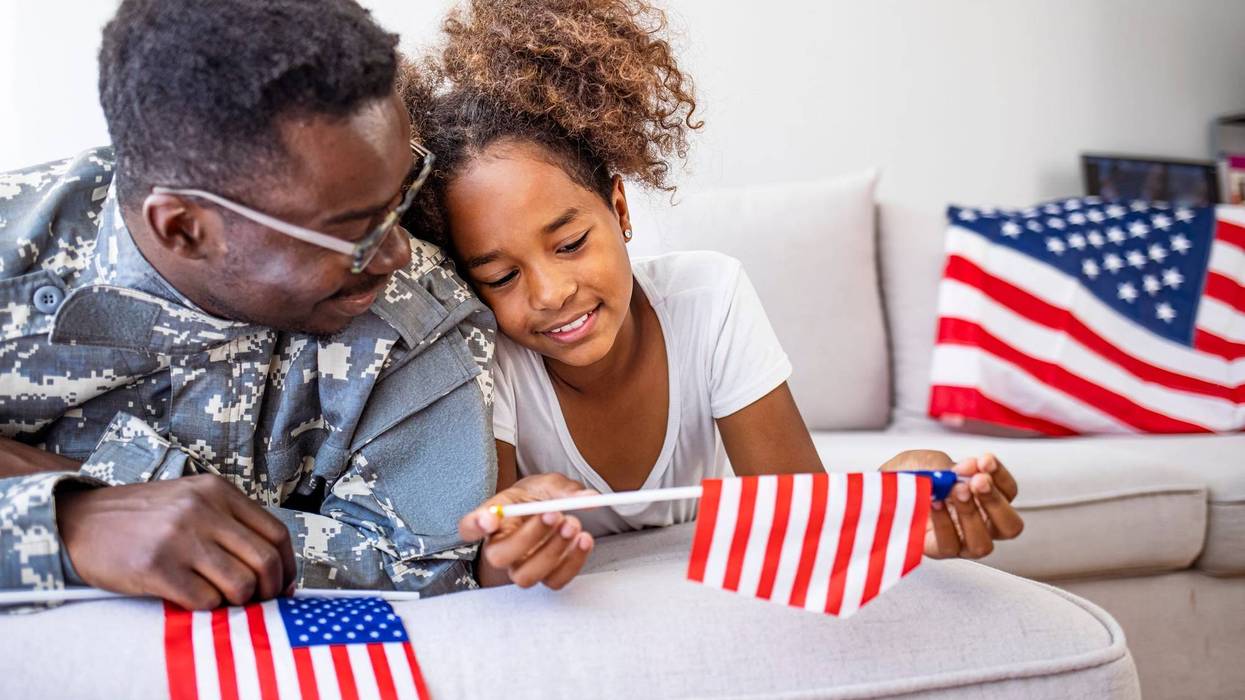 A veteran with his daughter.