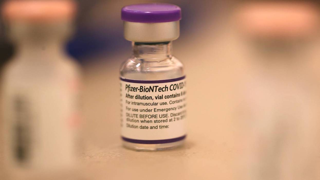 A vial of Pfizer COVID-19 booster vaccination sits on a table at a vaccination booster shot clinic on October 01, 2021 in San Rafael, California.