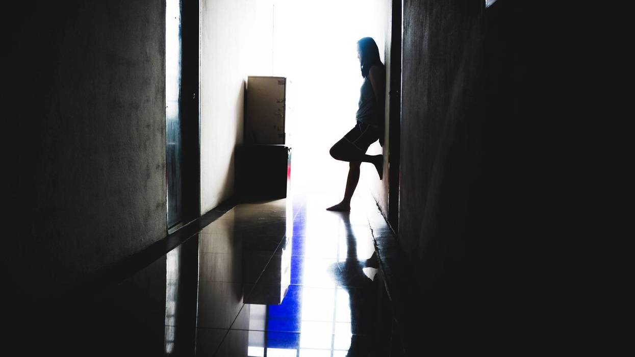 A victim of human trafficking.