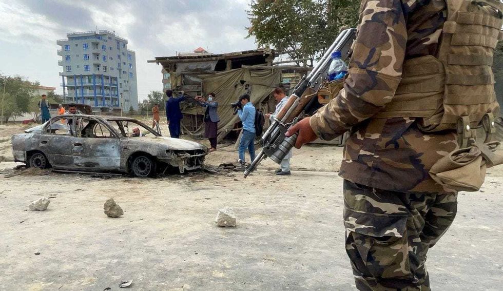 A view from the scene after at least five rockets were fired at the Afghan capital Kabul