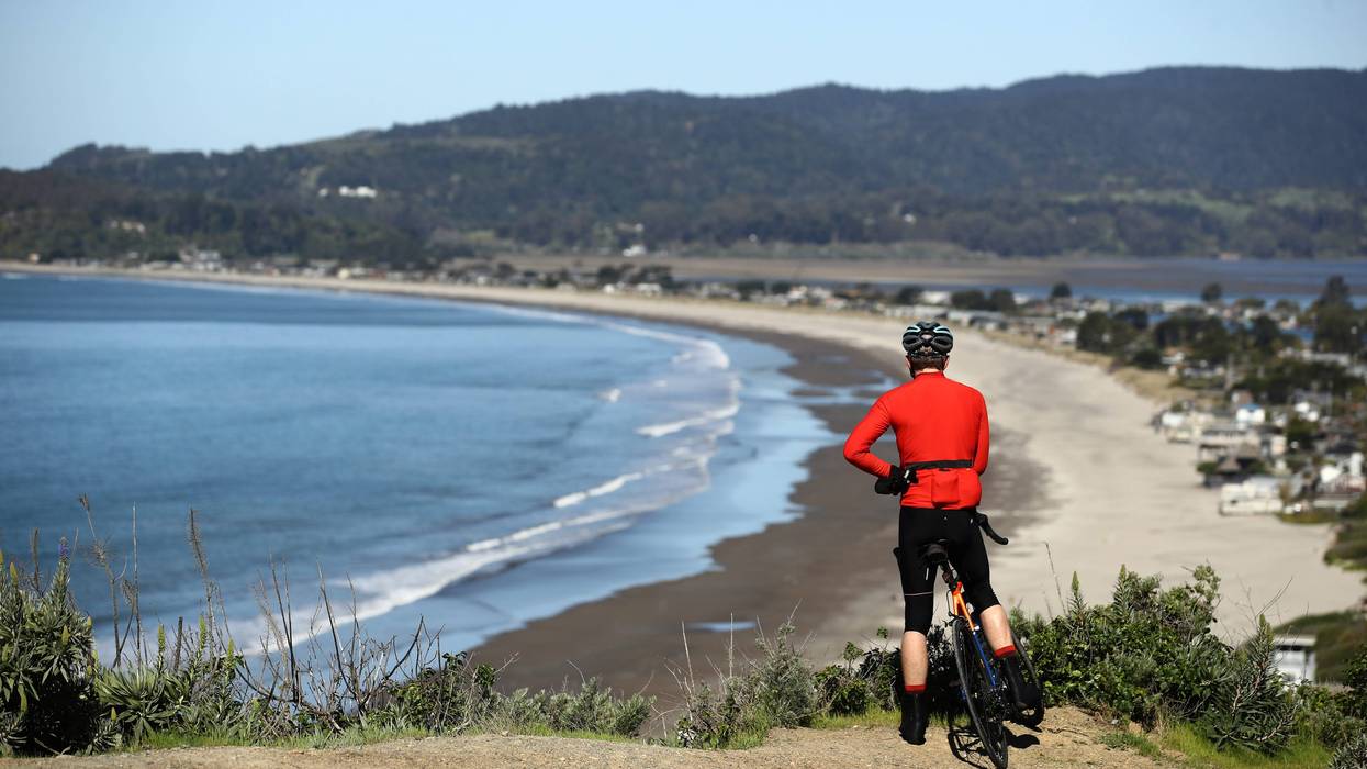 A view of a cyclist at Stinson Beach