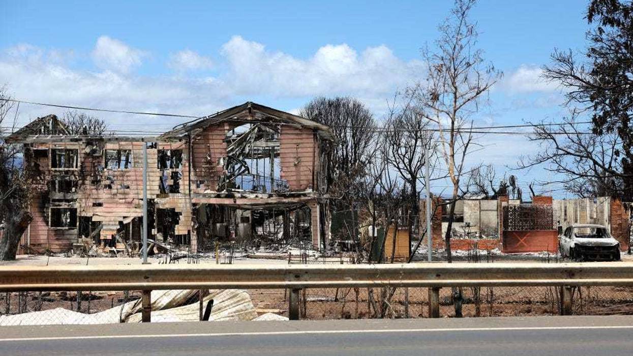 A view of a neighborhood that was destroyed by a wildfire on August 16, 2023 in Lahaina, Hawaii. At least 106 people were killed and thousands were displaced after a wind-driven wildfire devastated the towns of Lahaina and Kula early last week. Crews are continuing to search for missing people. (Photo by Justin Sullivan/Getty Images)