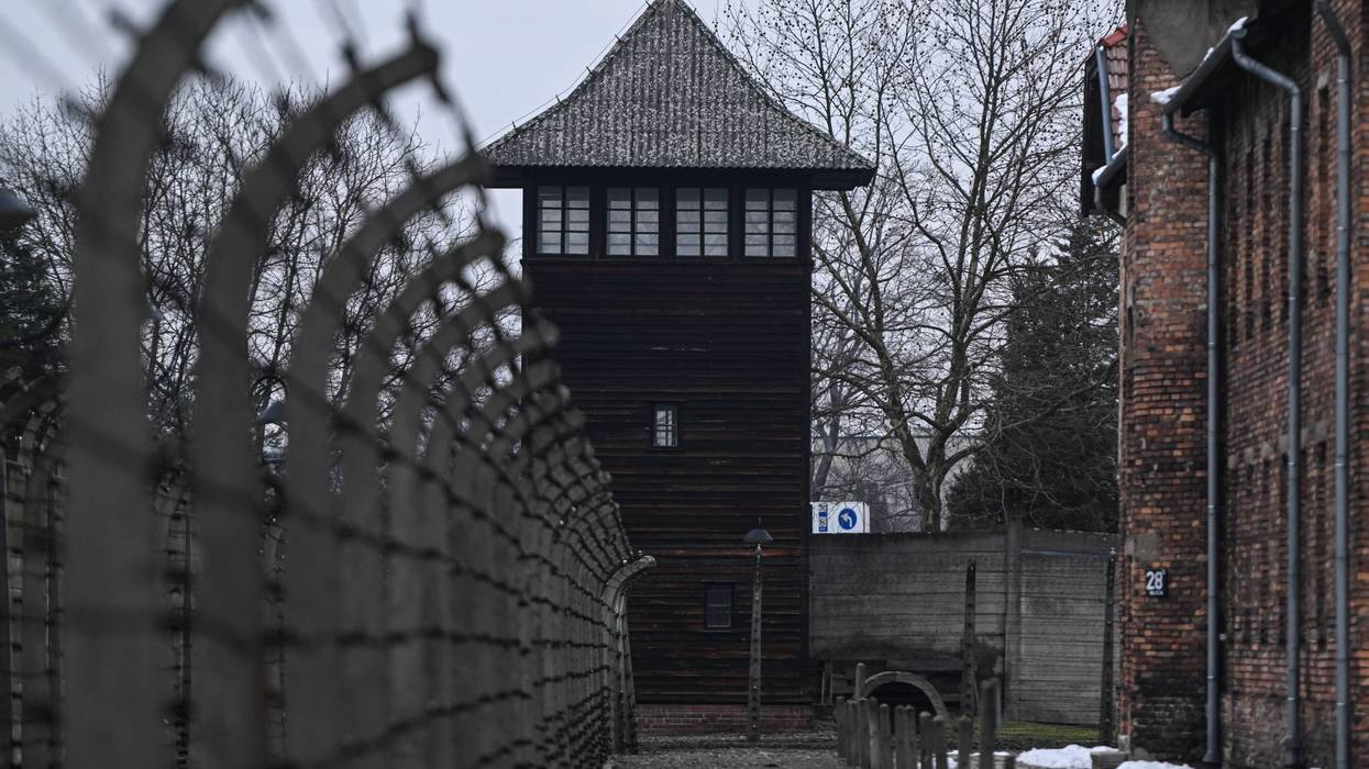 A view of barbed wire fence and surveillance towers at the former Nazi death camp Auschwitz I on Jan. 26, 2023 in Oswiecim, Poland. International Holocaust Remembrance Day, Jan. 27, is observed on the anniversary of the liberation of Auschwitz-Birkenau, the largest Nazi death camp.