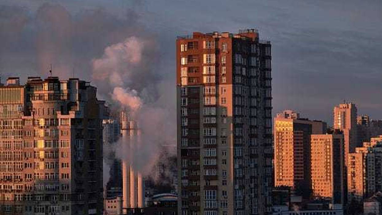 A view of Kyiv during a curfew in the early morning with steam from a heating plant on February 28, 2022 in Kyiv, Ukraine.