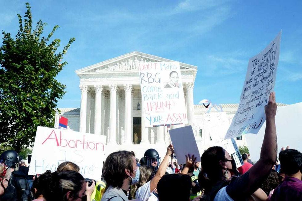 A view of signage at the Rally For Abortion Justice on October 02, 2021 in Washington, DC.