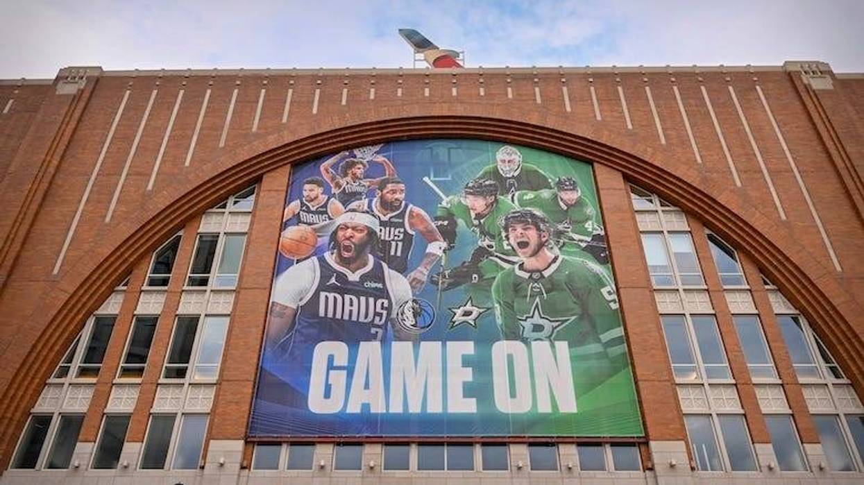 A view of the new banner for the NBA Dallas Mavericks and NHL Dallas Stars outside of the American Airlines Center featuring photos of Mavericks forward Anthony Davis and guard Kyrie Irving and center Dereck Lively II and guard Klay Thompson before the game between the Mavericks and the Sacramento Kings