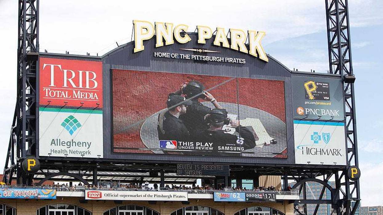 A view of the scoreboard during a play under review