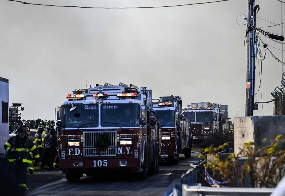 A view of the site as a massive fire broke out at an NYPD impound and evidence storage warehouse in Brooklyn on December 13, 2022 in Brooklyn
