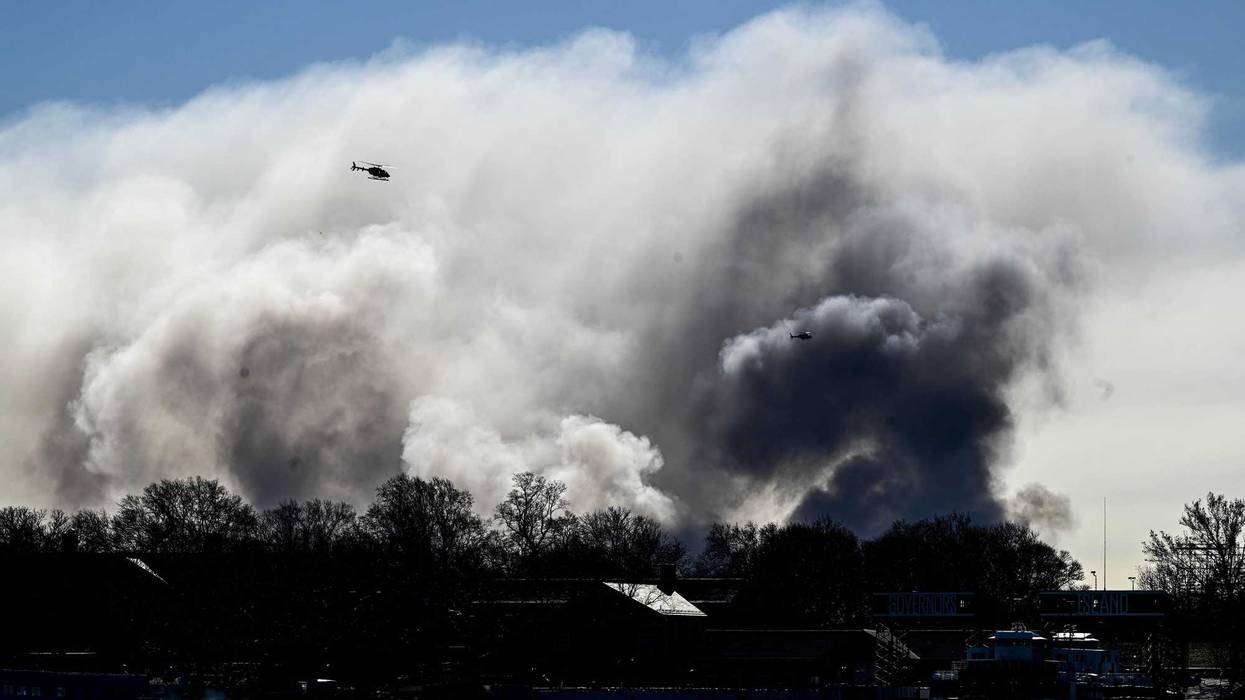 A view of the site as a massive fire broke out at an NYPD impound and evidence storage warehouse in Brooklyn on December 13, 2022 in Brooklyn