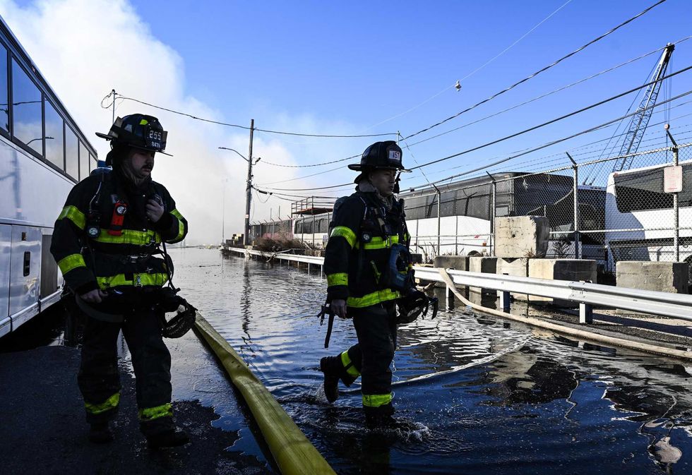 A view of the site as a massive fire broke out at an NYPD impound and evidence storage warehouse in Brooklyn on December 13, 2022 in Brooklyn.