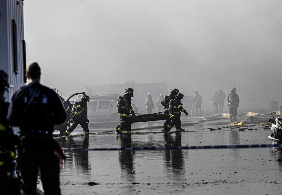 A view of the site as a massive fire broke out at an NYPD impound and evidence storage warehouse in Brooklyn on December 13, 2022 in Brooklyn.