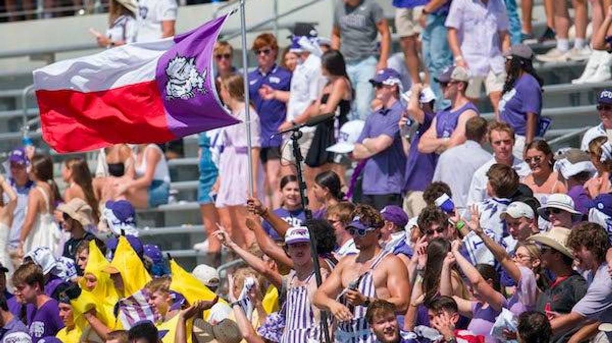 A view of the TCU Horned Frogs fans and students and Texas flag during the second half of the game between the TCU Horned Frogs and the SMU Mustangs at Amon G. Carter Stadium