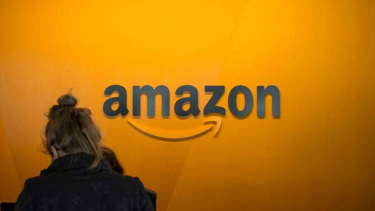 A visitor checks in at the Amazon corporate headquarters on June 16, 2017 in Seattle, Washington.
