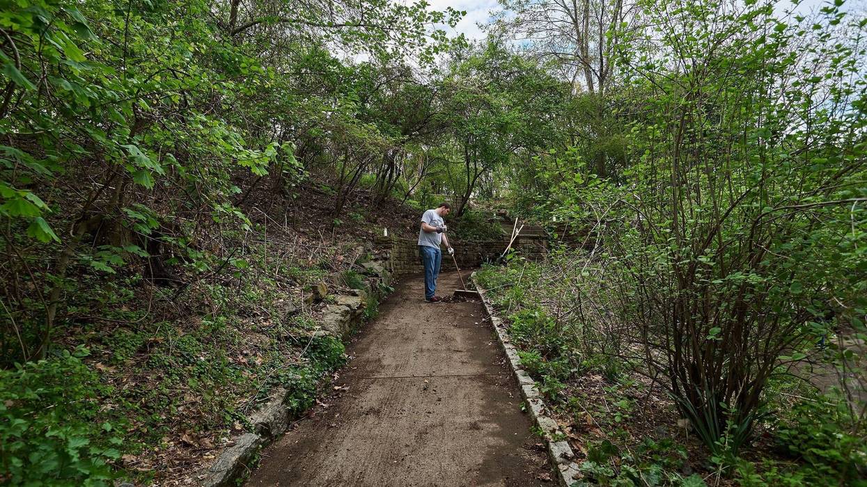 A volunteer takes part in the Fairmount Park Conservancy's Love Your Park Solo campaign.