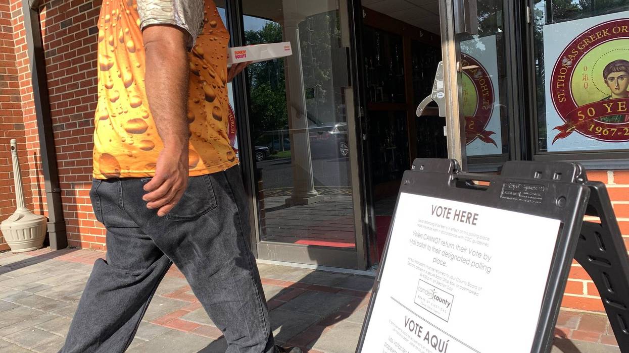 A voter enters a polling place in Cherry Hill, N.J., on June 8, 2021.