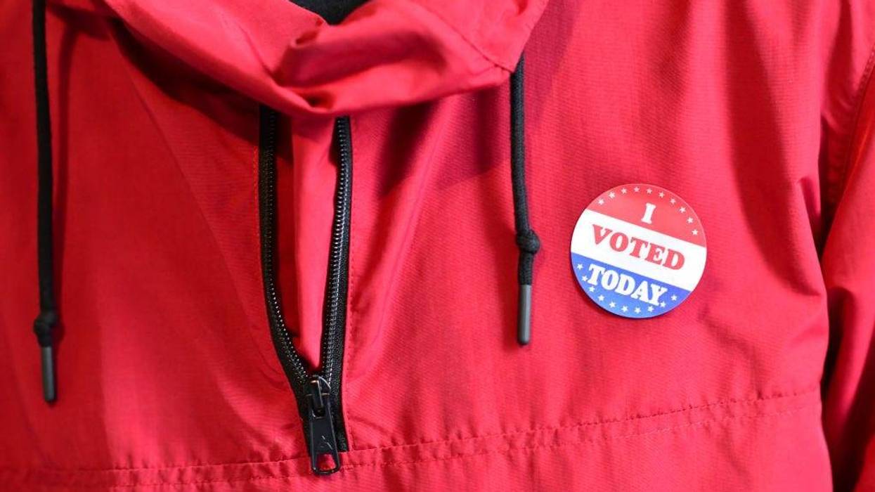 A voter wears an "I VOTED TODAY" sticker after casting his ballot at the Philadelphia City Hall satellite polling station on October 27, 2020 in Philadelphia, Pennsylvania.