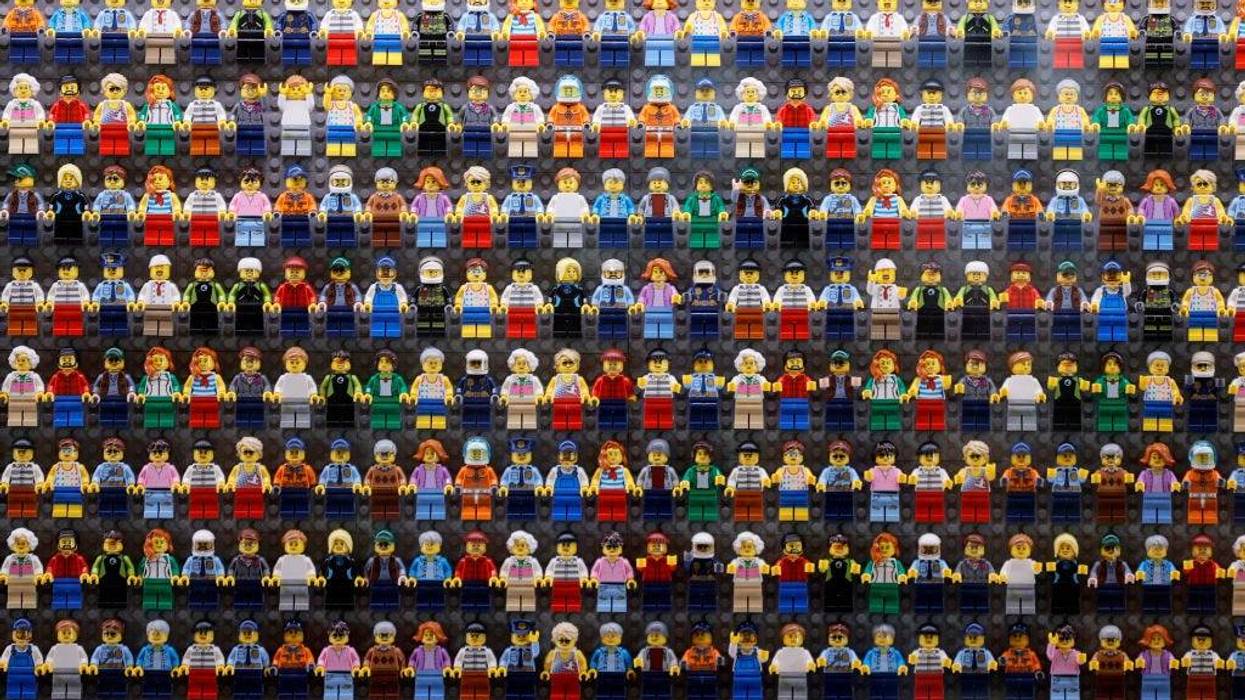 A wall of LEGO minifigures (detail) is encased inside the lobby of the LEGOLAND New York Hotel during its grand opening at the LEGOLAND Resort on August 06, 2021 in Goshen, New York