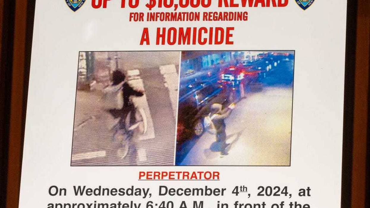 A wanted poster is set up for an NYPD press conference regarding a homicide that authorities believe was a targeted attack at One Police Plaza on December 4, 2024,