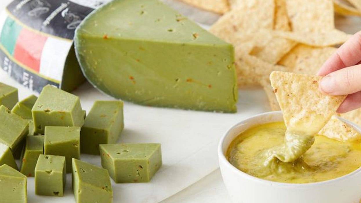 A wedge of green guacamole cheese from Dairy Dairy of Holland