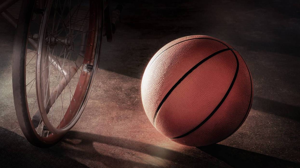 A wheelchair and a basketball.
