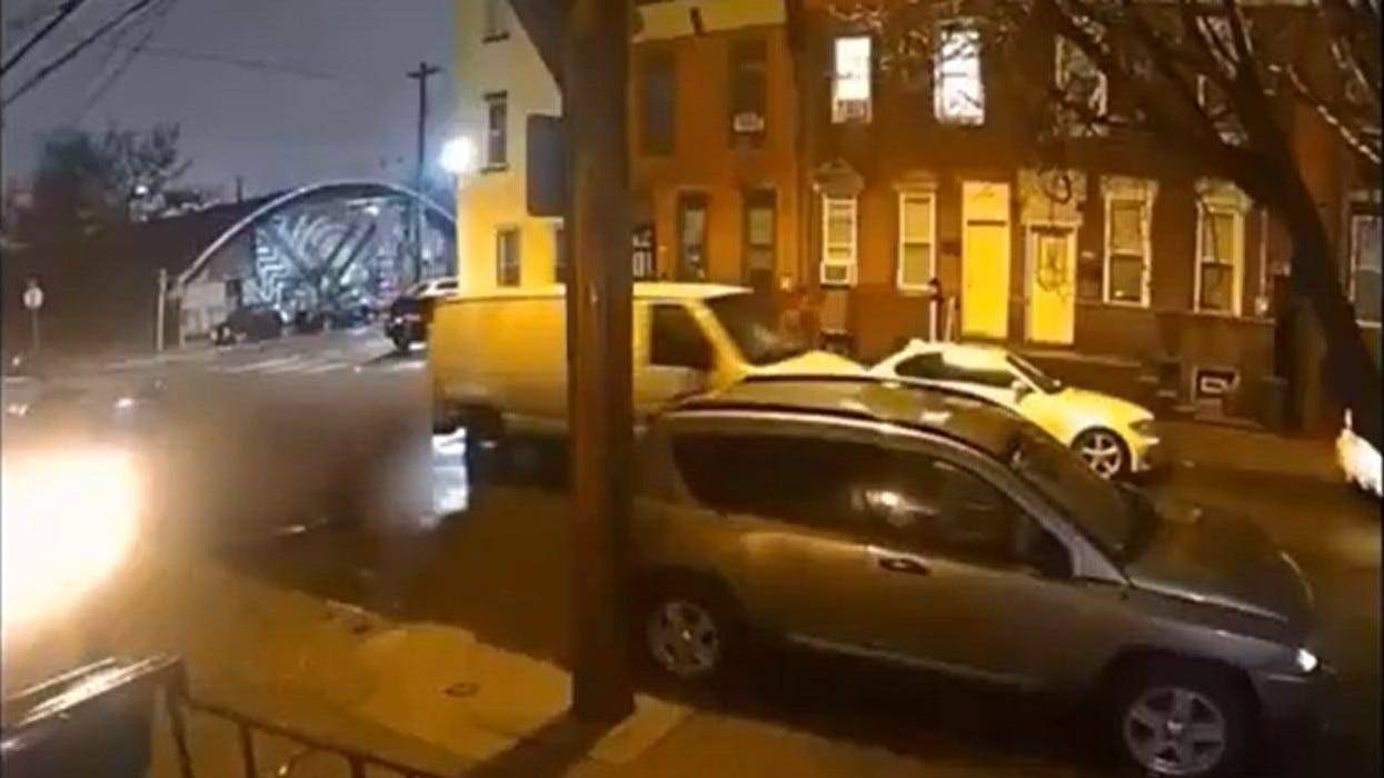A white van is captured on video fleeing the scene of a hit-and-run that killed a bicyclist on Sunday evening.