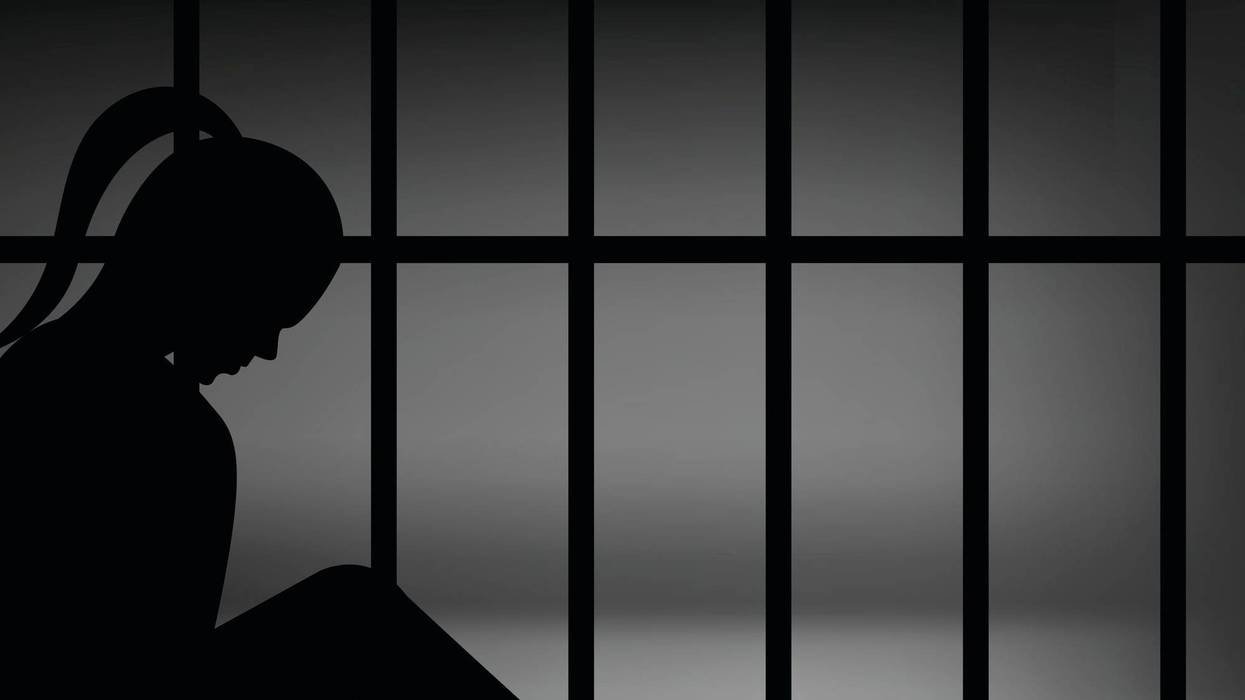 A woman in jail.