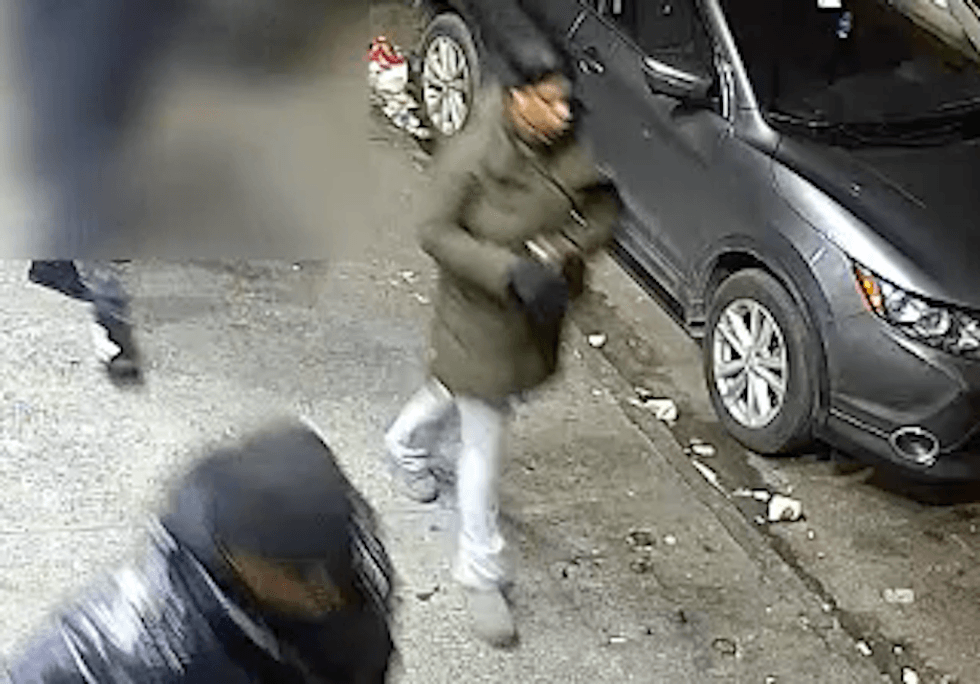 A woman is among the three people police are searching for in the robbery