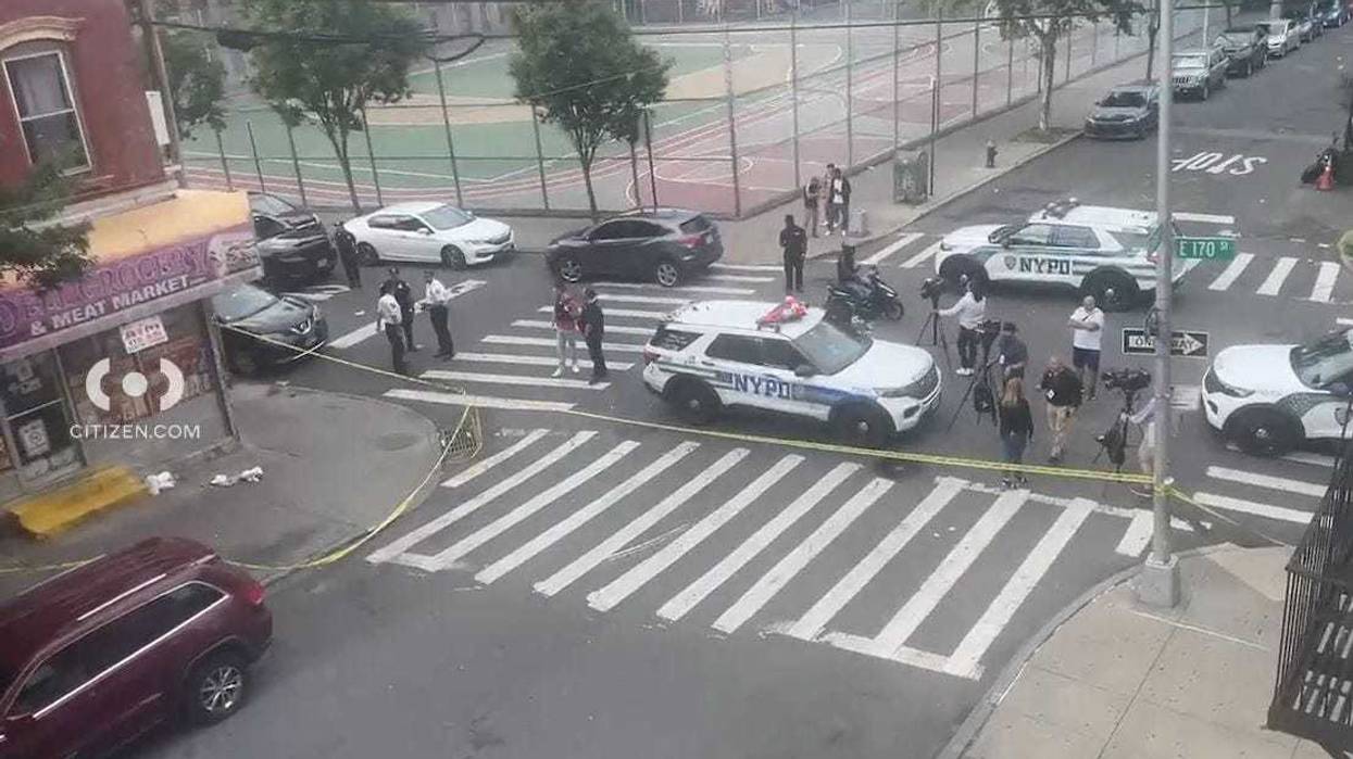 A woman is in critical condition after being shot in the shoulder outside of a Bronx bodega on Thursday afternoon.