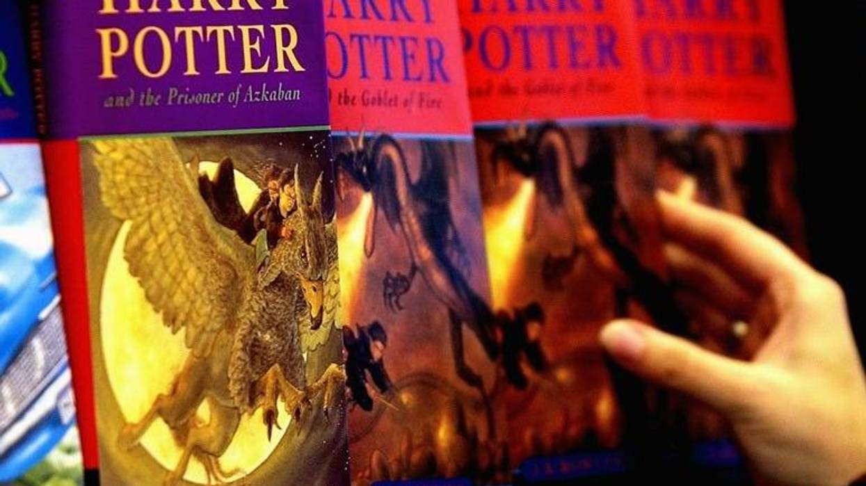 A woman looks at some of J.K Rowlings Harry Potter books in waterstones book store on June 16, 2003 in London.